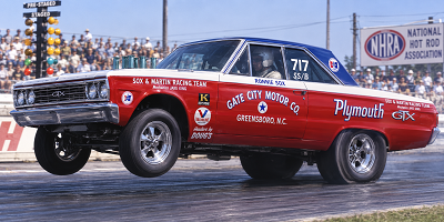 Ronnie Sox driving a Sox and Martin Plymouth