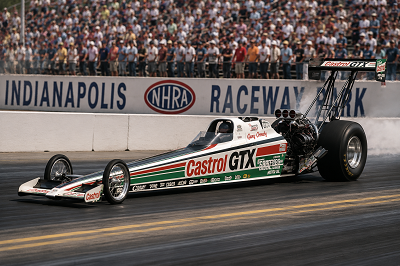 Gary Ormsby racing the green white and red Castrol GTX Top Fuel dragster