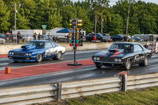 Grumpy Old Geezer Racing drag car performing a burnout before staging